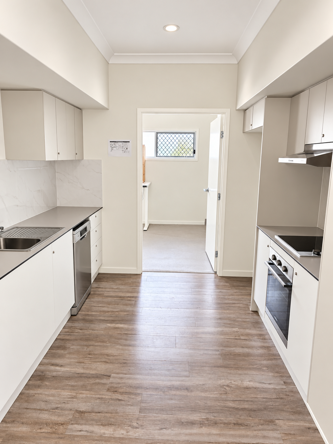 Bright Minimalist Galley Kitchen.png