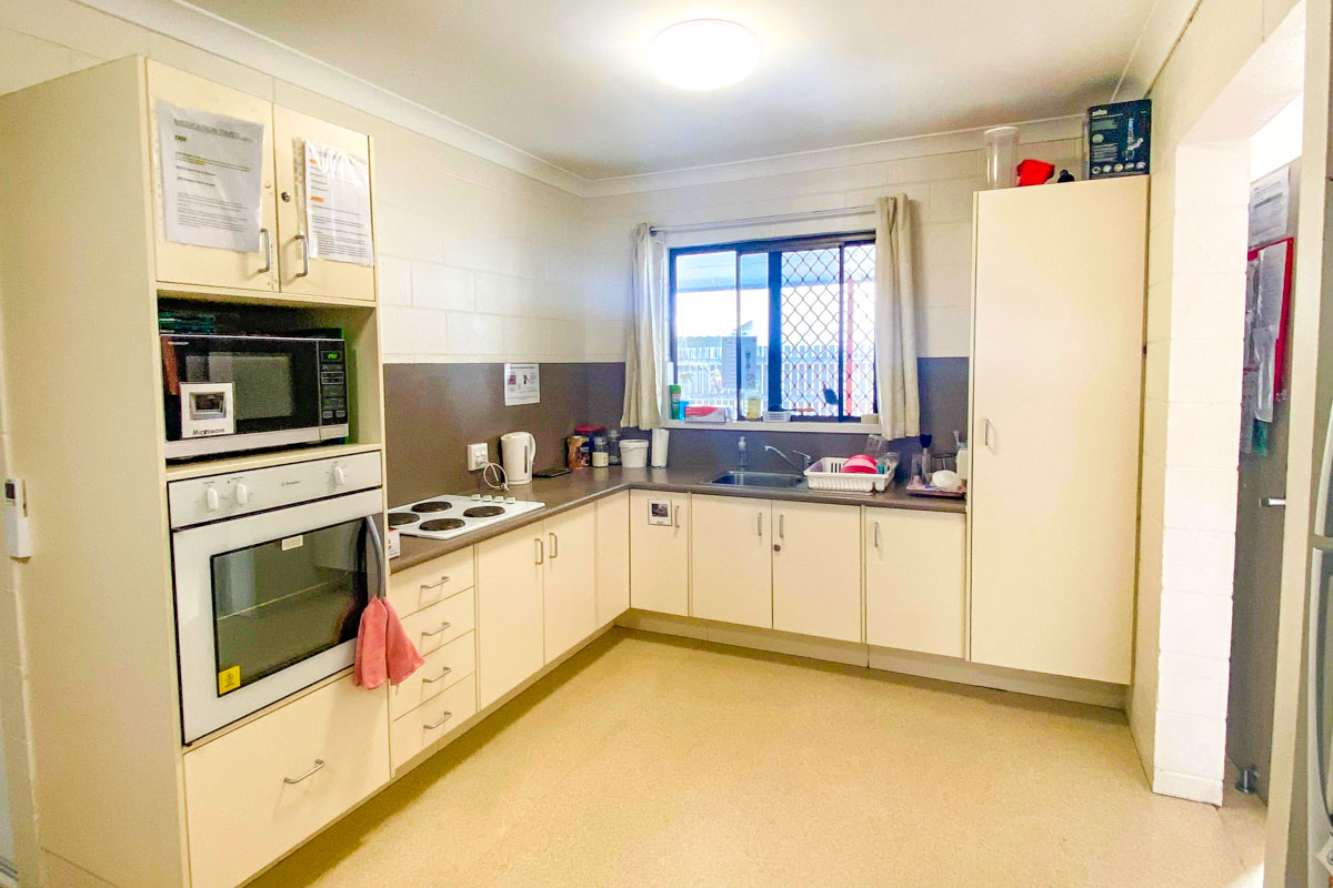 A suburban area with close access to local shops and community amenities. — Home image 2