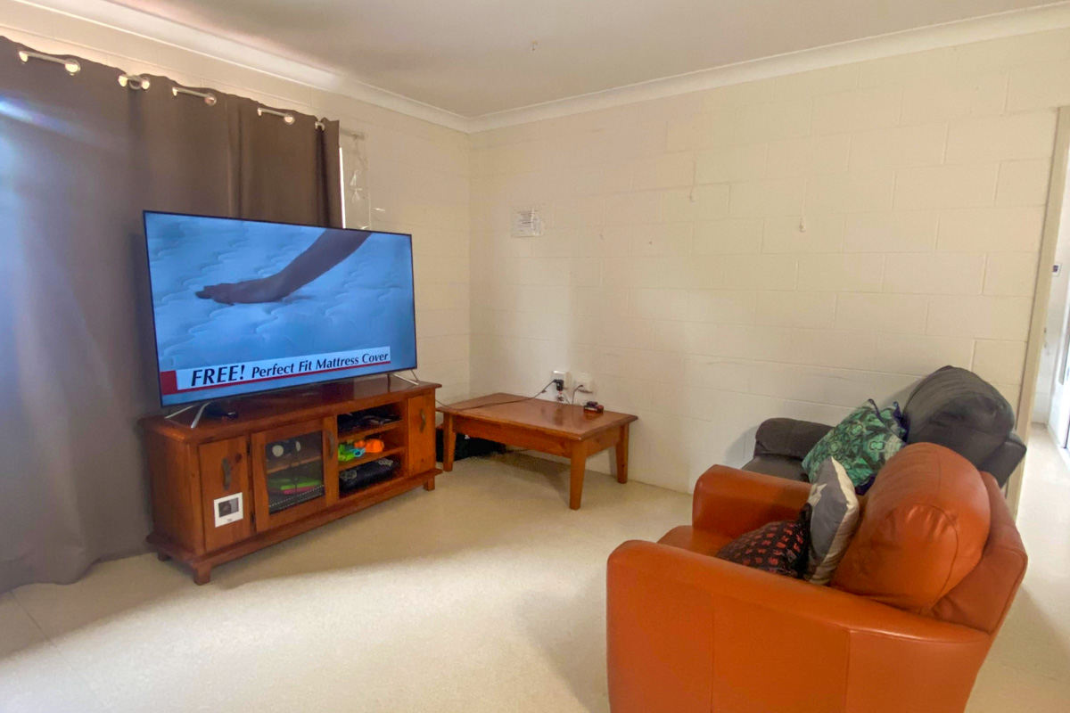 A suburban area with close access to local shops and community amenities. — Home image 3
