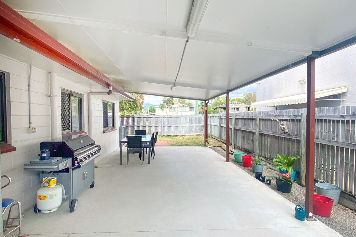 A suburban area with close access to local shops and community amenities. — Home image 5