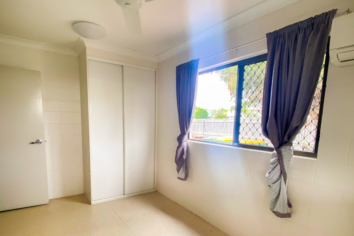 A suburban area with close access to local shops and community amenities. — Home image 7