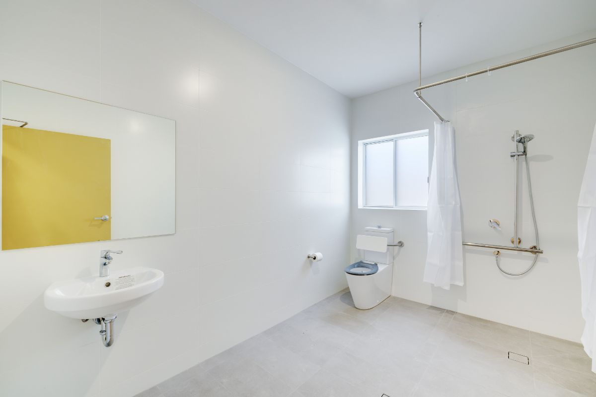 Brand new 3-bedroom High Physical Support home in Wyee, featuring open-plan living, media room, and private outdoor space — Home image 5