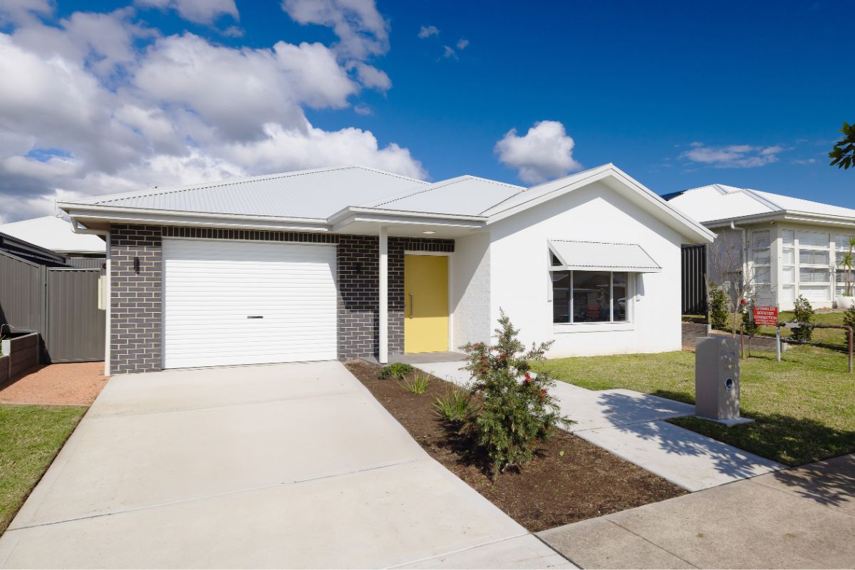 Brand new 3-bedroom High Physical Support home in Wyee, featuring open-plan living, media room, and private outdoor space — Home image 6
