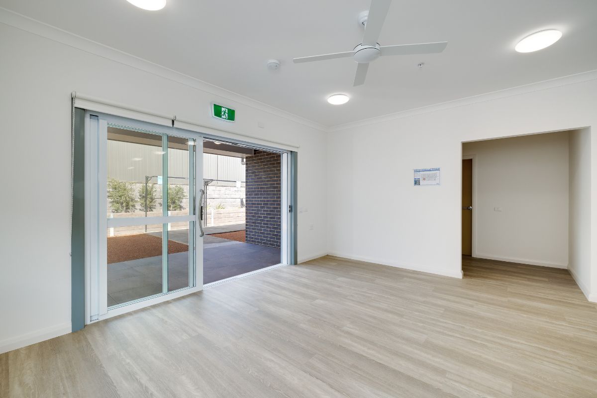 Brand new 3-bedroom High Physical Support home in Wyee, featuring open-plan living, media room, and private outdoor space — Home image 7