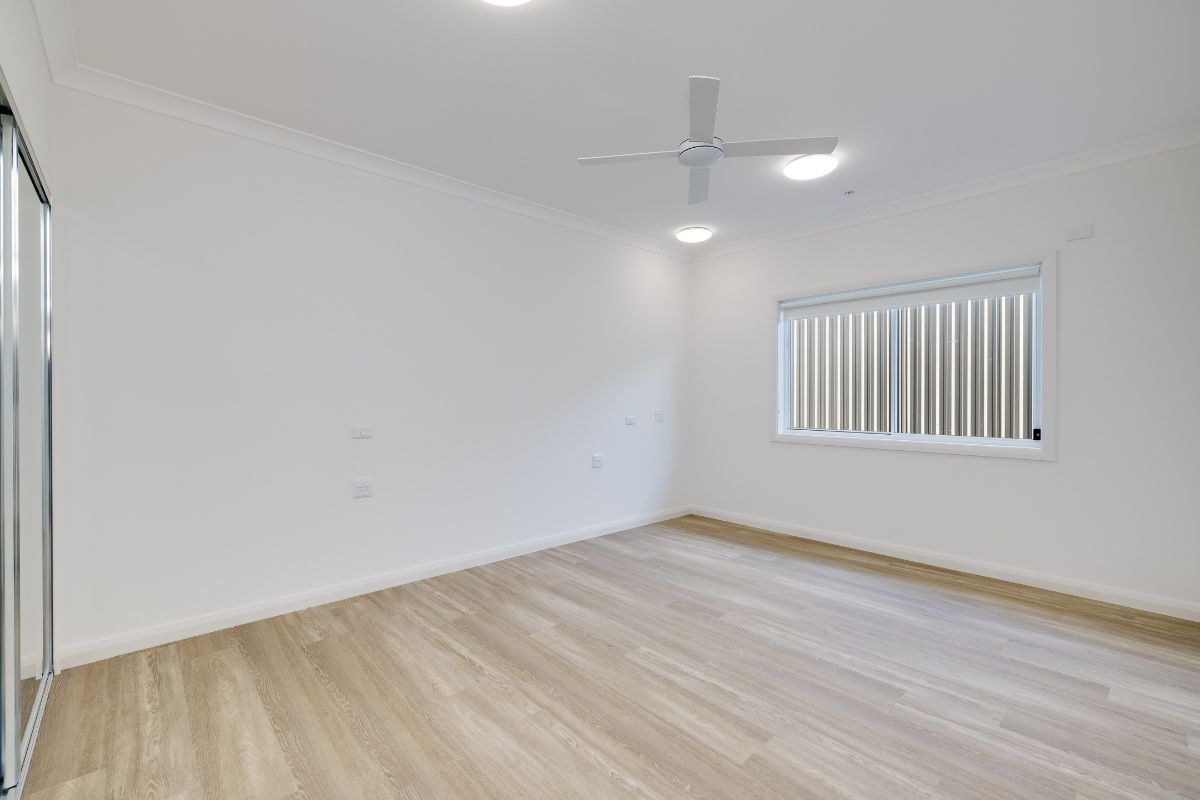 Brand new 3-bedroom High Physical Support home in Wyee, featuring open-plan living, media room, and private outdoor space — Home image 10