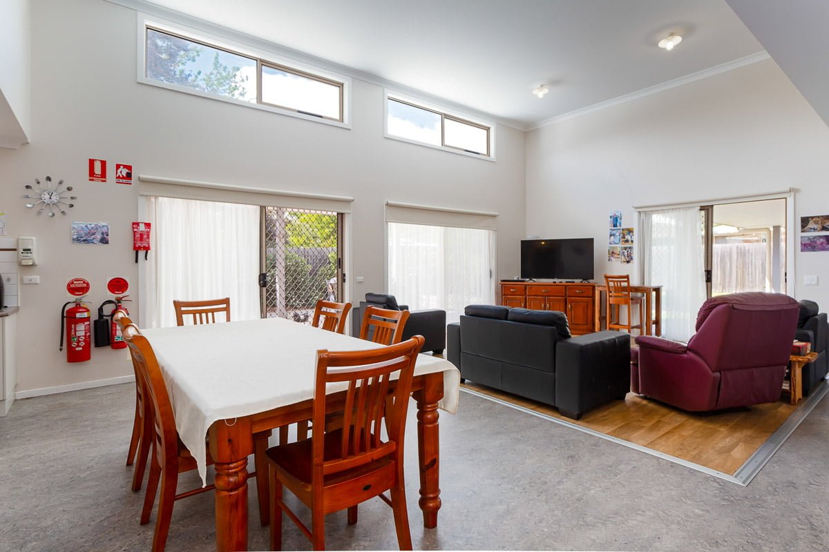 Enjoy living in a home with well-kept gardens and access to community areas. — Home image 3