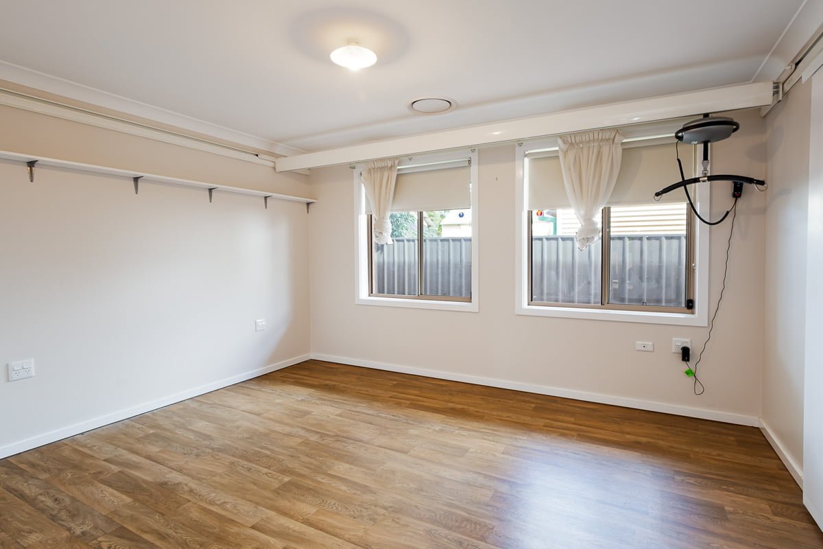 Enjoy living in a home with well-kept gardens and access to community areas. — Home image 7