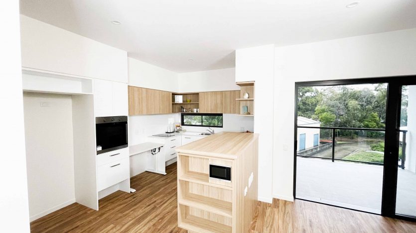 Modern fully-accessible one-bedroom apartment in SIL supported Vertical Village — Home image 2