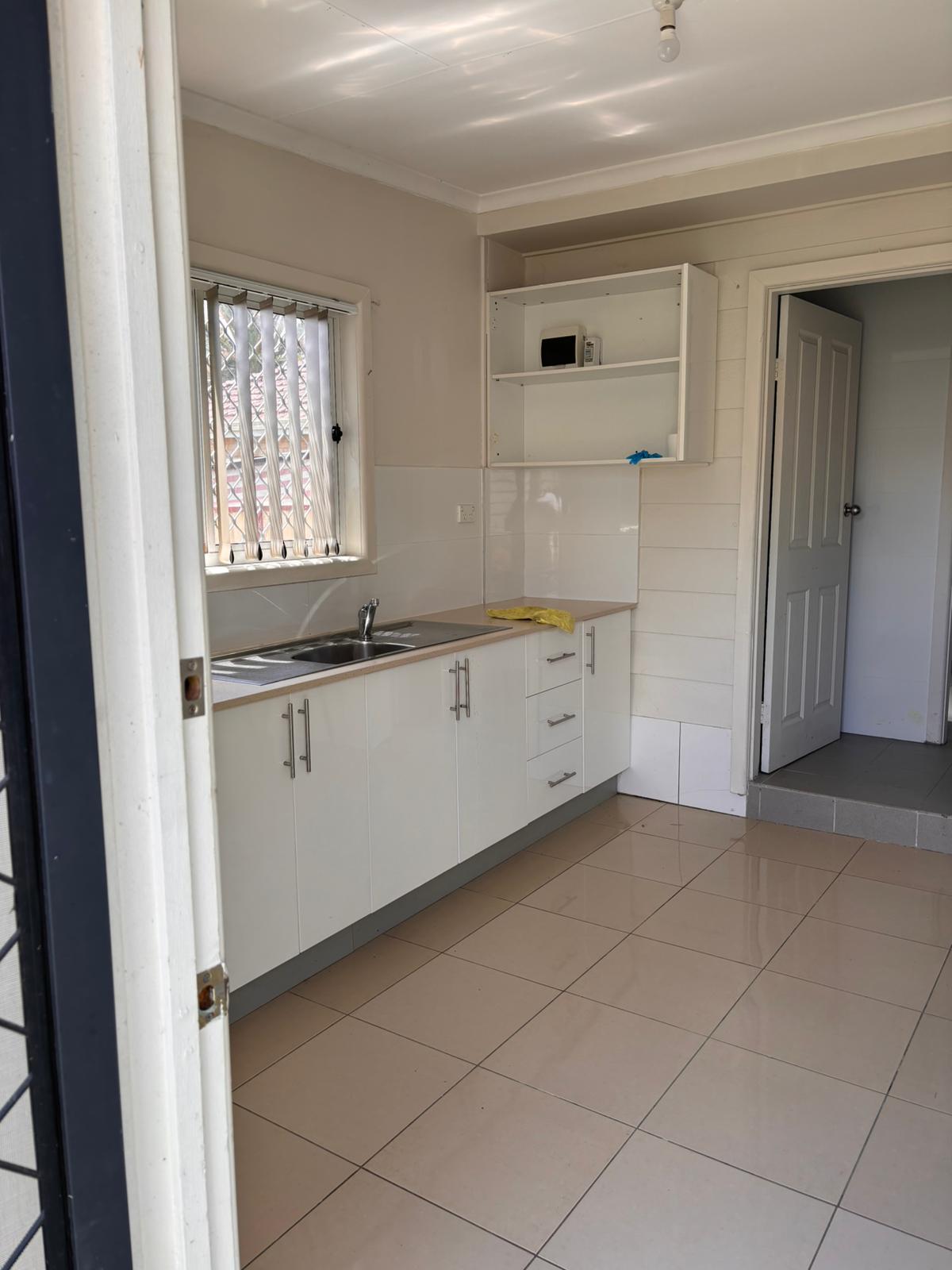 SIL House with 2 Granny Flats – Spacious Living in Condell Park — Home image 9