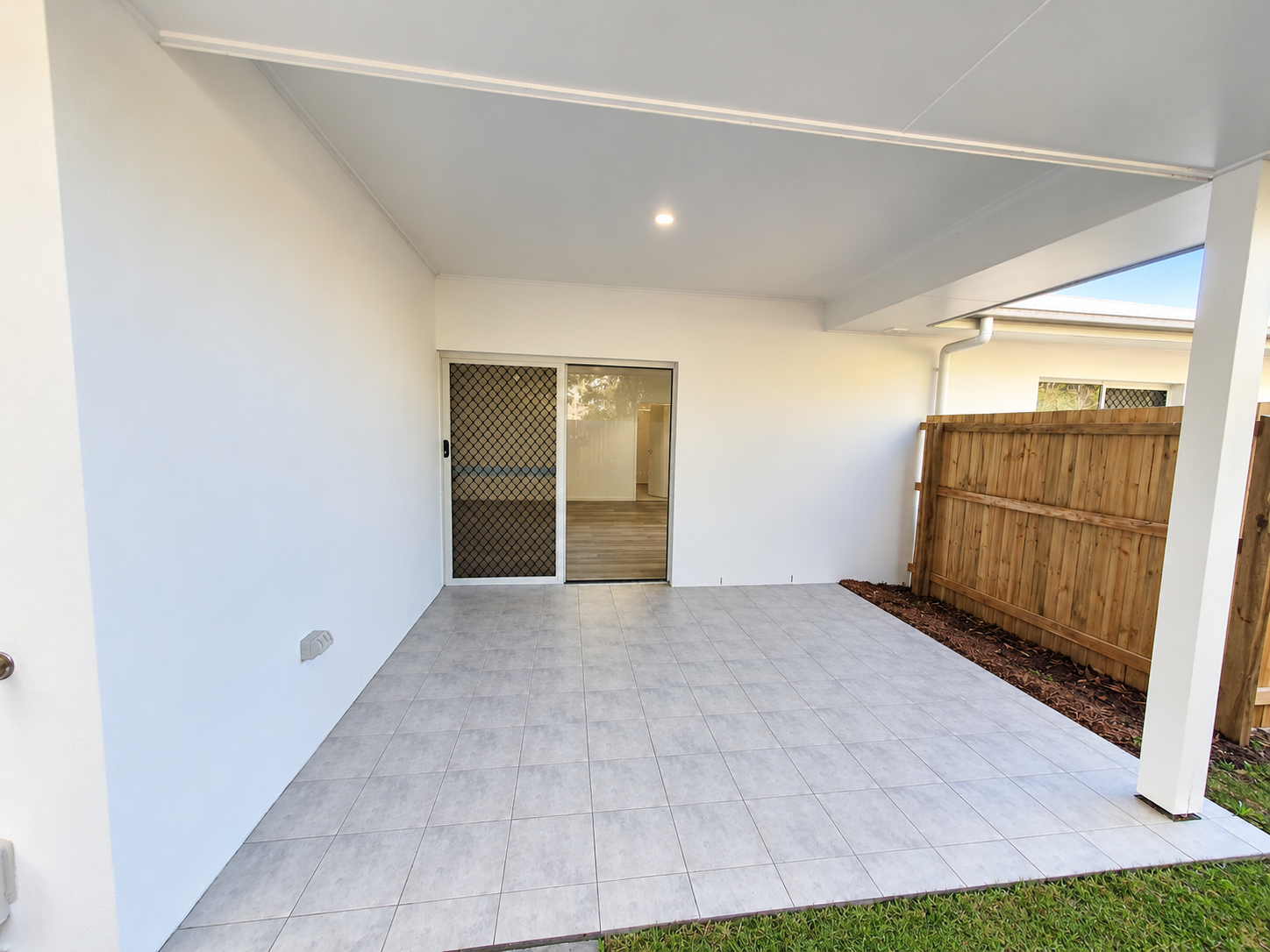 Bright Modern Patio with Sliding Door.png
