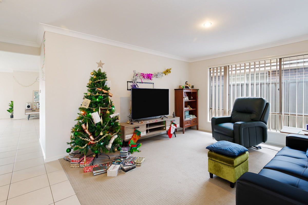 Enjoy living on a quiet residential street with a short drive to local shops. — Home image 2