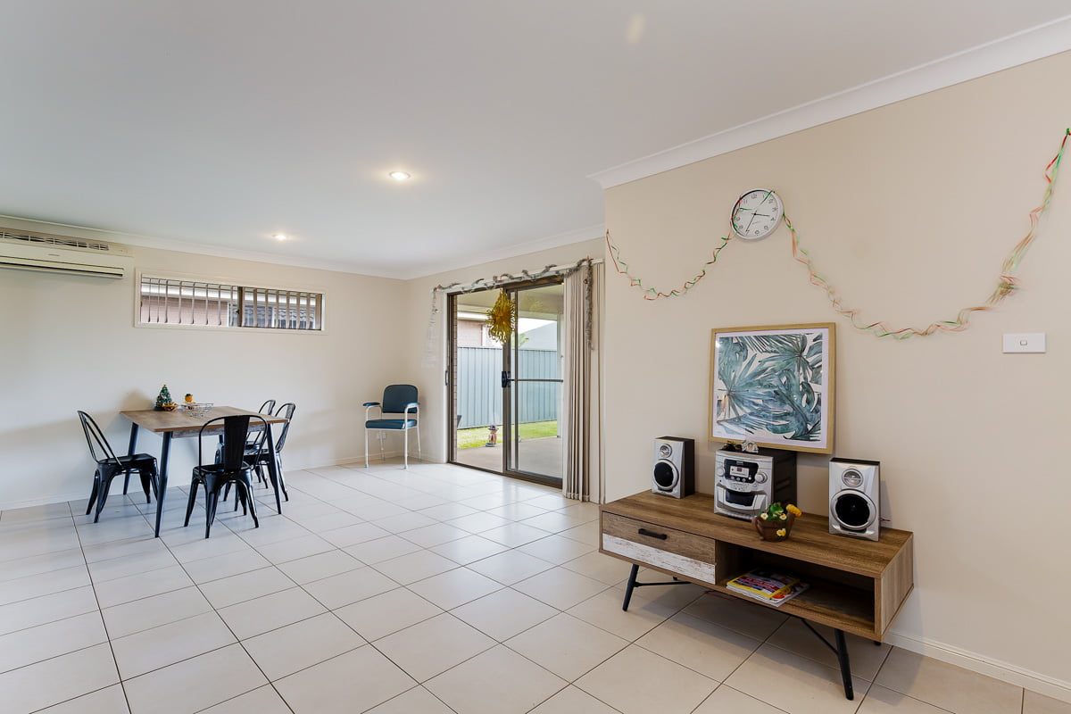 Enjoy living on a quiet residential street with a short drive to local shops. — Home image 4