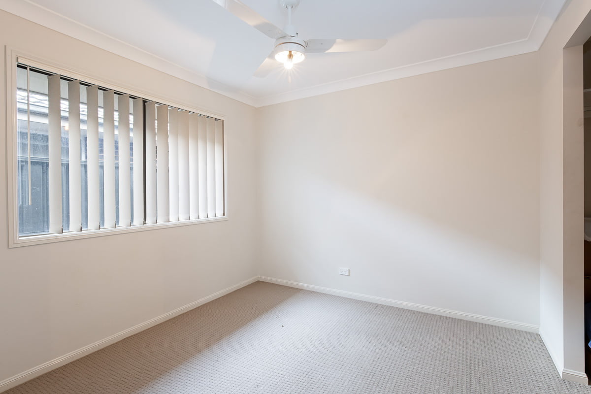 Enjoy living on a quiet residential street with a short drive to local shops. — Home image 5