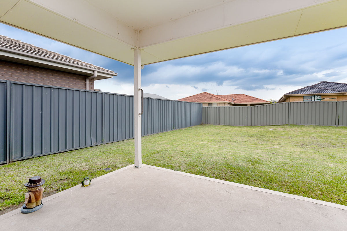 Enjoy living on a quiet residential street with a short drive to local shops. — Home image 6