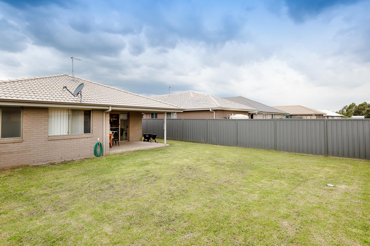 Enjoy living on a quiet residential street with a short drive to local shops. — Home image 7