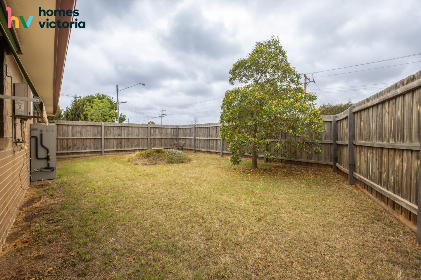 Comfortable living with a bright, sunny yard — Home image 10