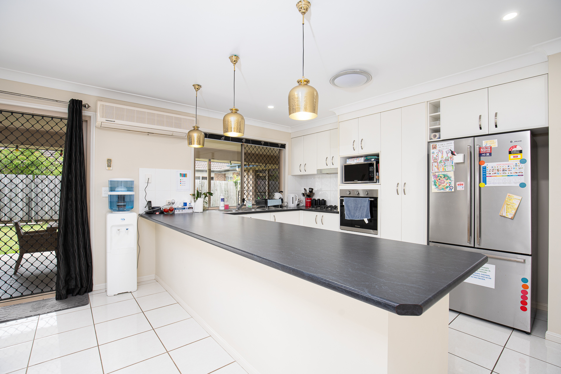 Modern SIL home in Caboolture with open-plan living and outdoor entertainment — Home image 3
