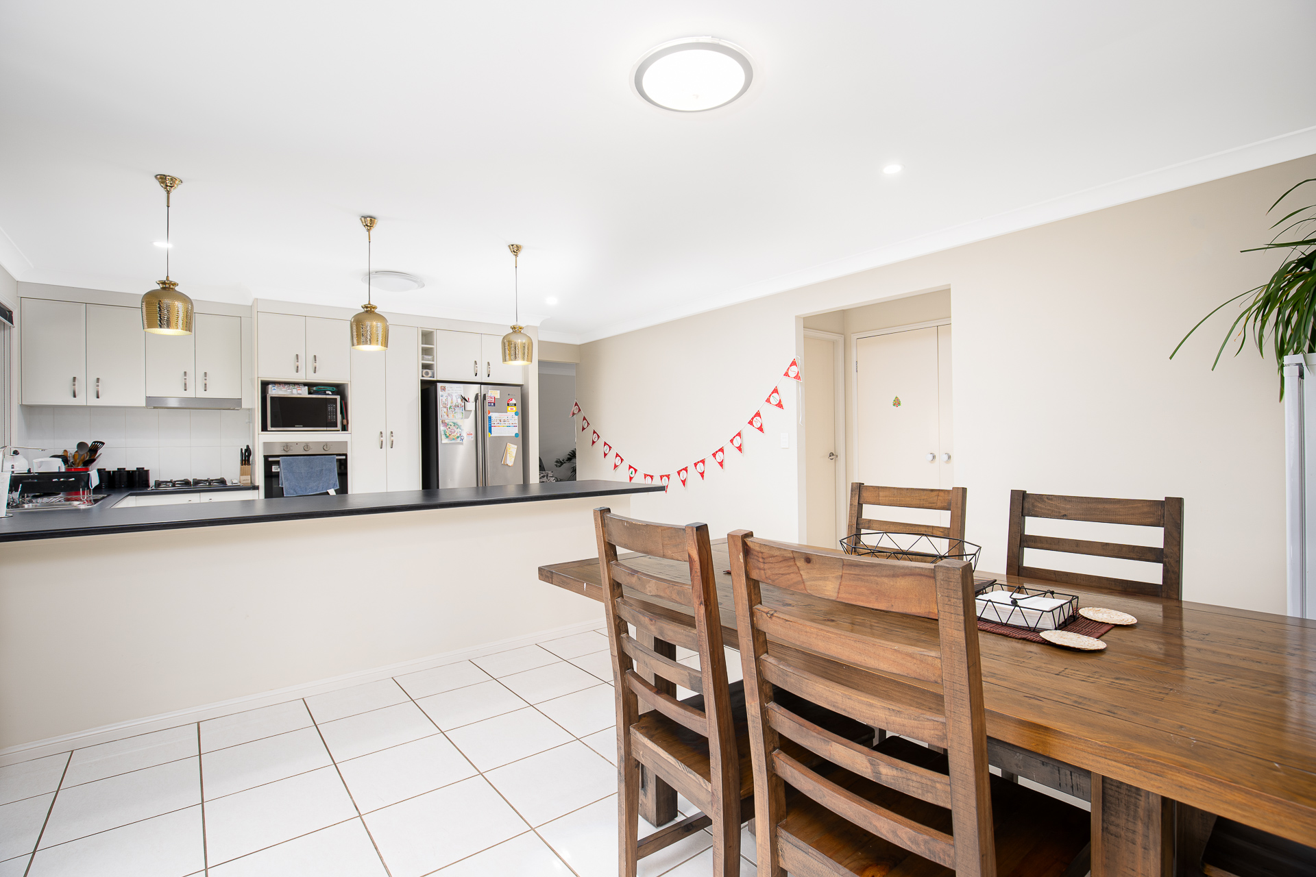 Modern SIL home in Caboolture with open-plan living and outdoor entertainment — Home image 5