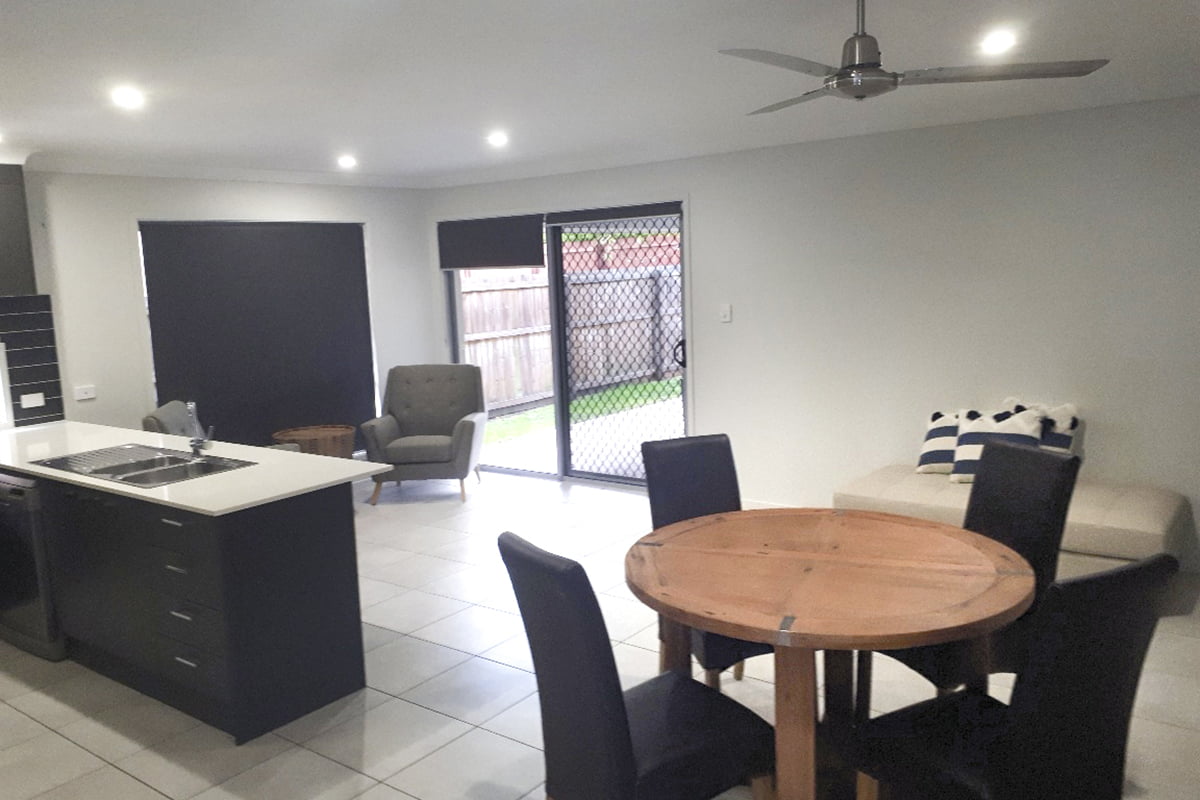 A modern home located in a sought after residential area, with access to local transport, shops and parks. — Home image 4