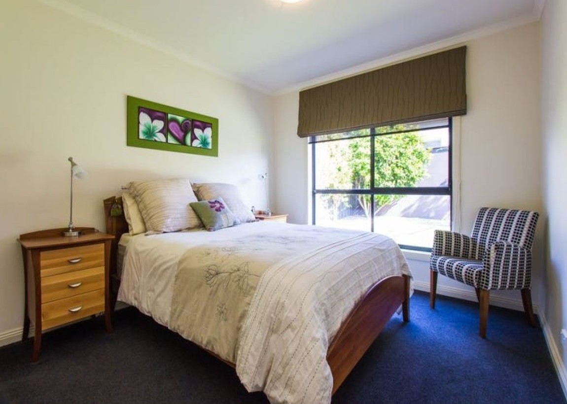 Spacious bedroom with private ensuite available in a modern SIL home in Newstead — Home image 9