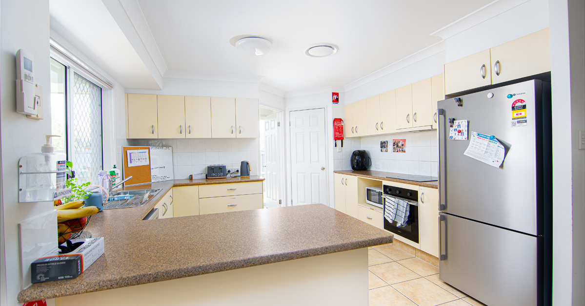 Pimpama retreat: spacious shared areas with fun-filled backyard — Home image 7