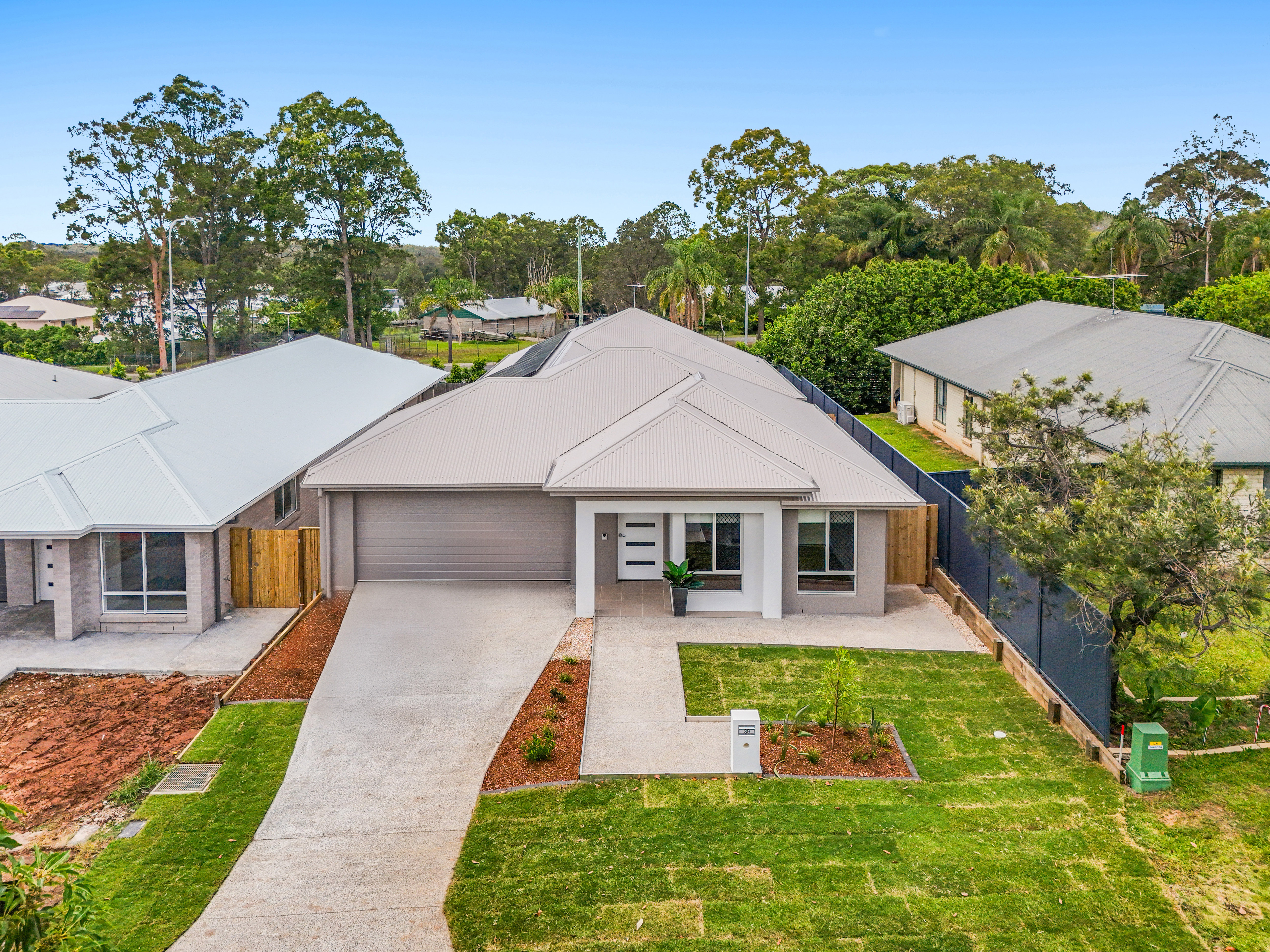Side by Side High Physical Support Houses, Ormeau — Home image 1
