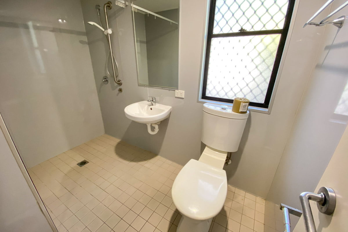 Fully accessible ensuite bedroom with kitchenette and private patio, with close access to shops and amenities. — Home image 8