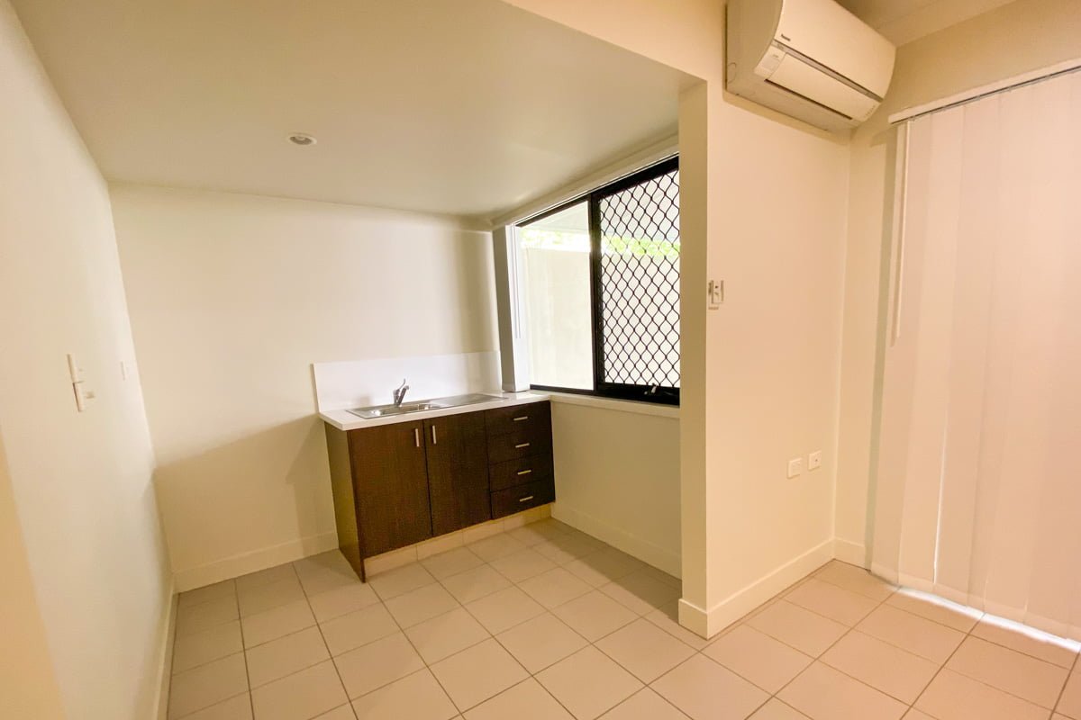 Fully accessible ensuite bedroom with kitchenette and private patio, with close access to shops and amenities. — Home image 10